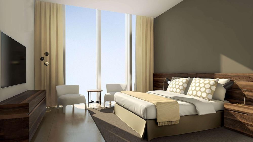 Aleph Doha Residences, Curio Collection By Hilton Luaran gambar A bedroom