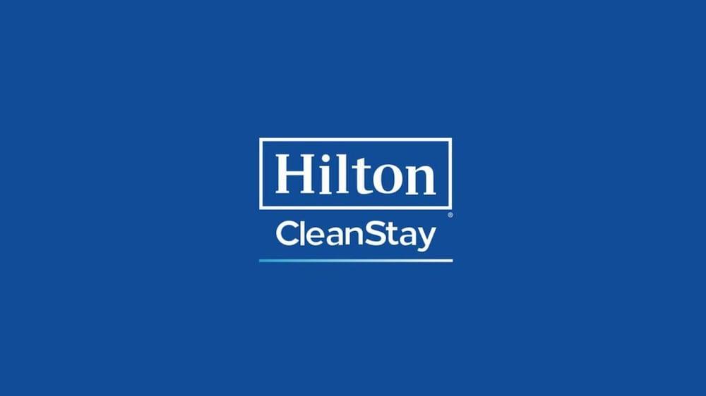 Aleph Doha Residences, Curio Collection By Hilton Luaran gambar Hilton CleanStay logo
