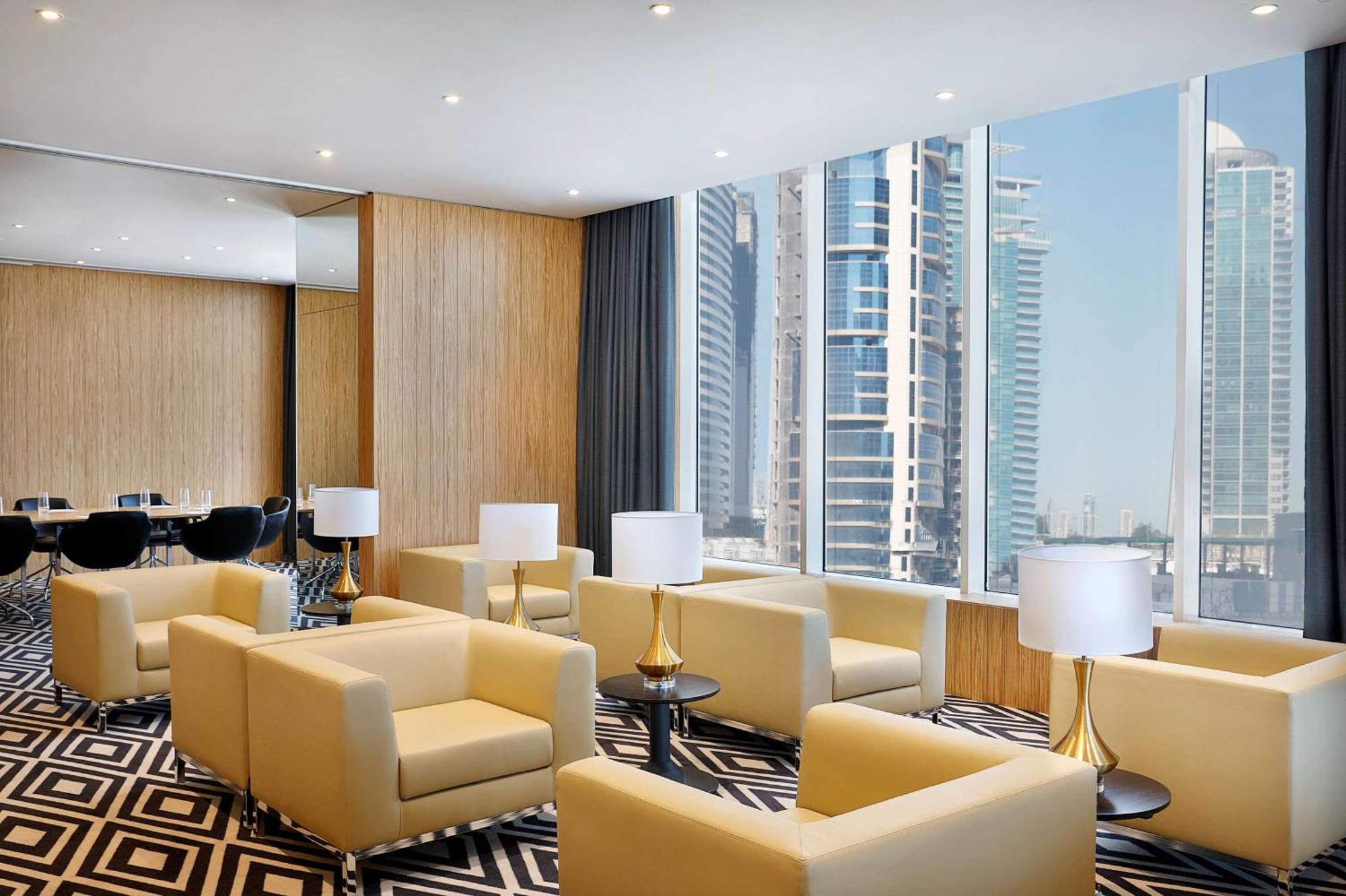 Aleph Doha Residences, Curio Collection By Hilton Luaran gambar The lounge at the airport