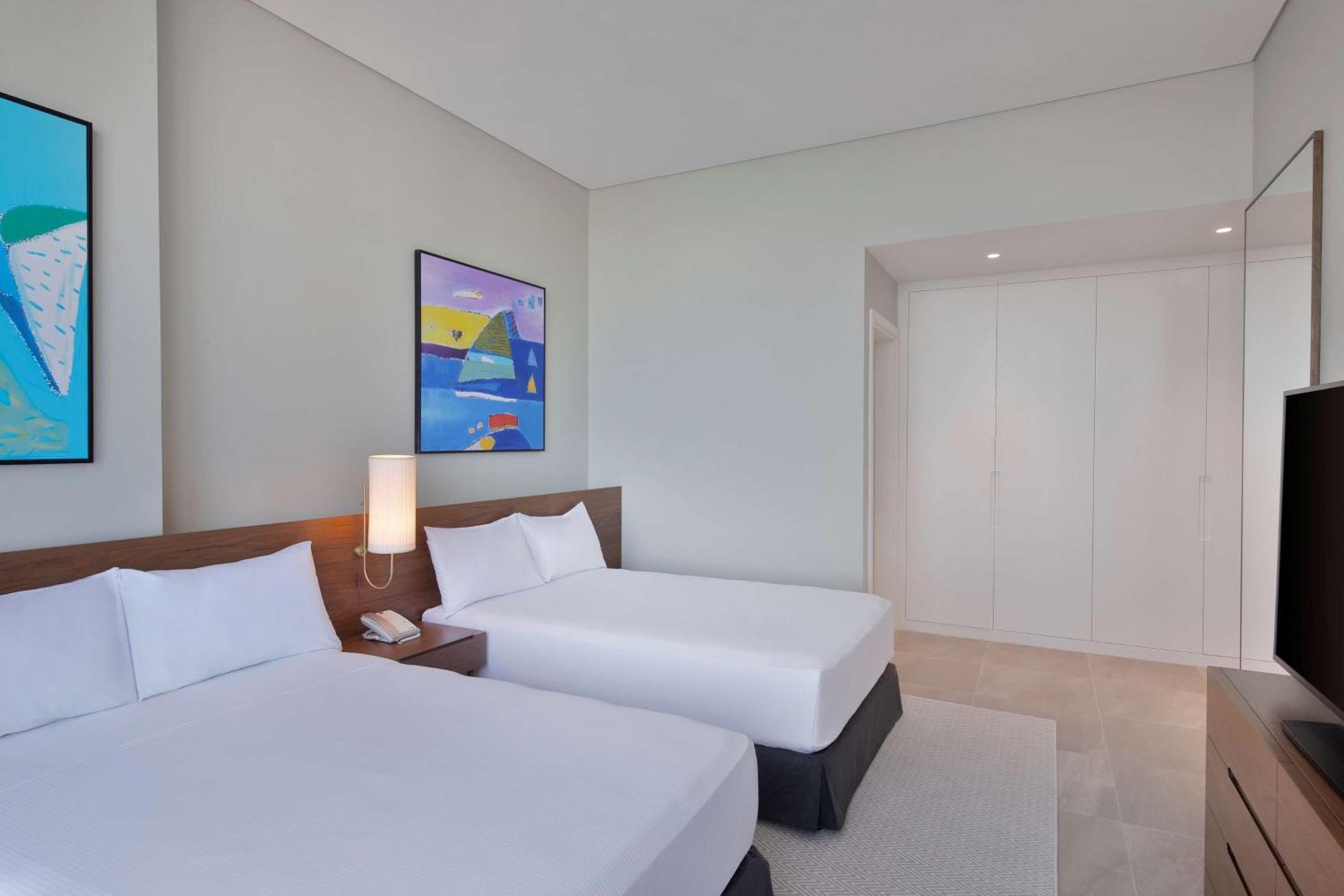 Aleph Doha Residences, Curio Collection By Hilton Luaran gambar Guest room