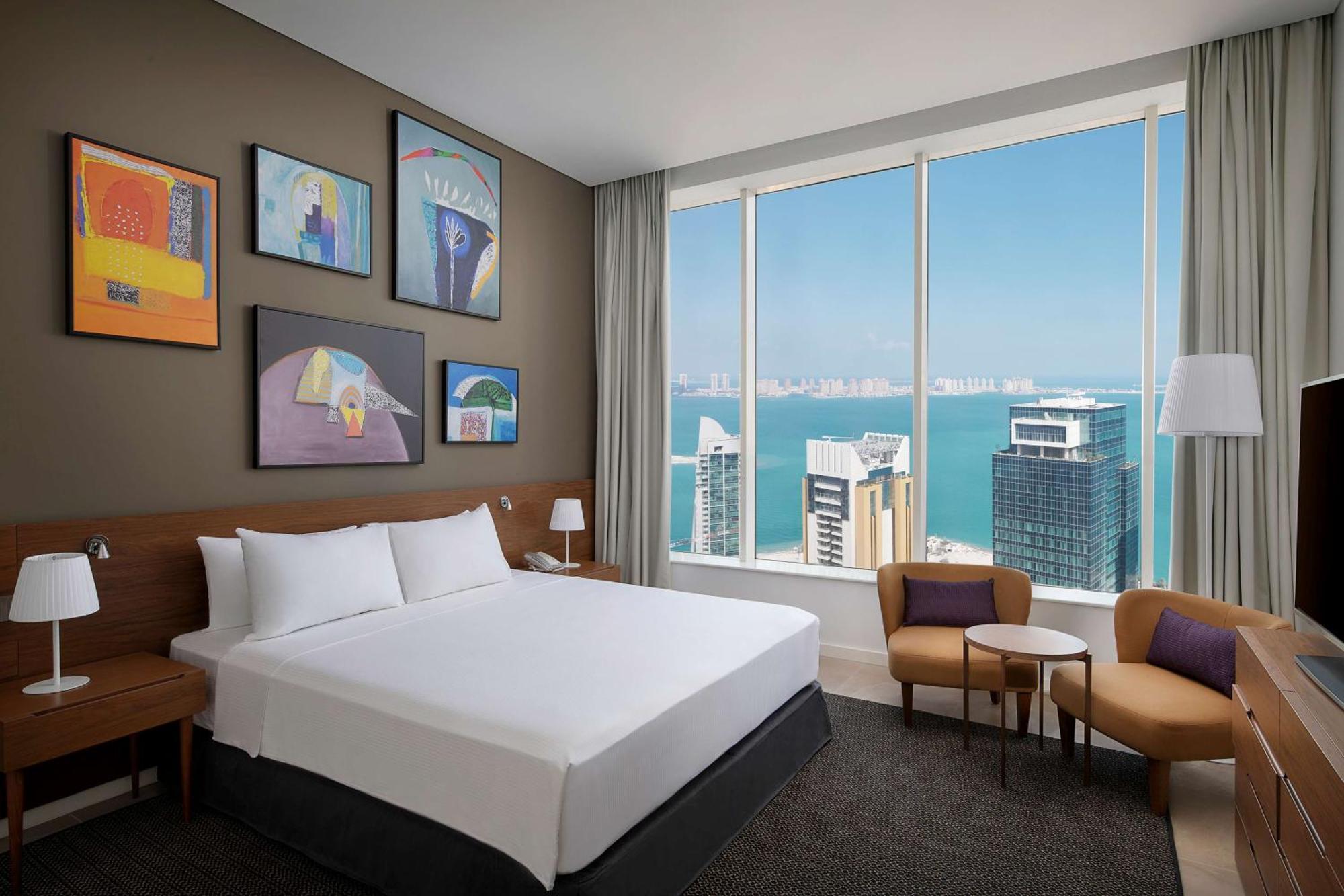 Aleph Doha Residences, Curio Collection By Hilton Luaran gambar A guest room at the hotel