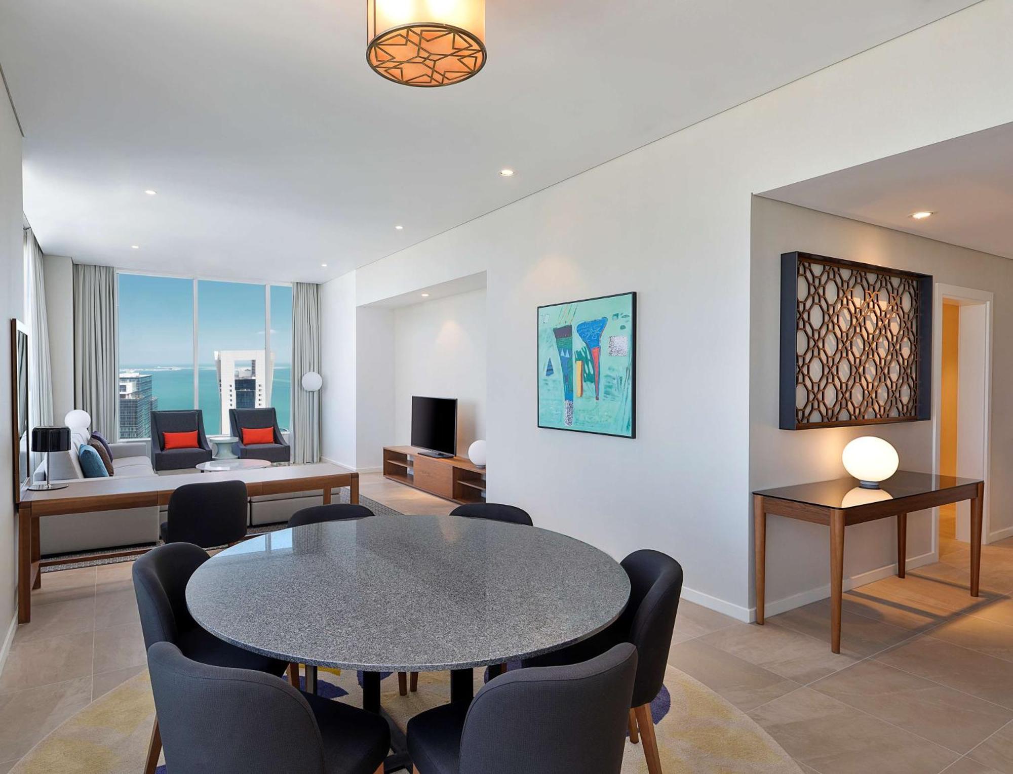 Aleph Doha Residences, Curio Collection By Hilton Luaran gambar A typical apartment interior