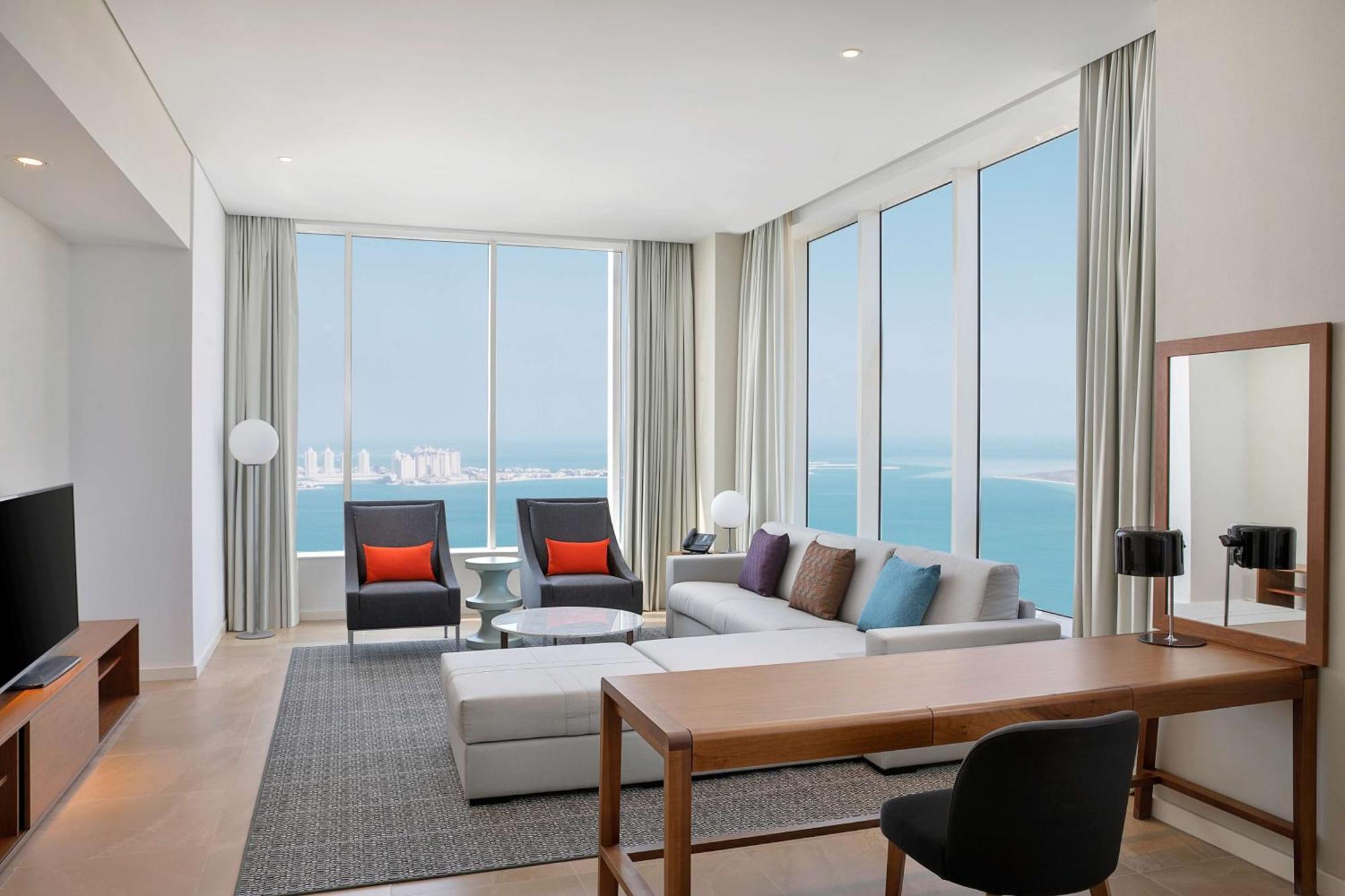 Aleph Doha Residences, Curio Collection By Hilton Luaran gambar A suite at the hotel