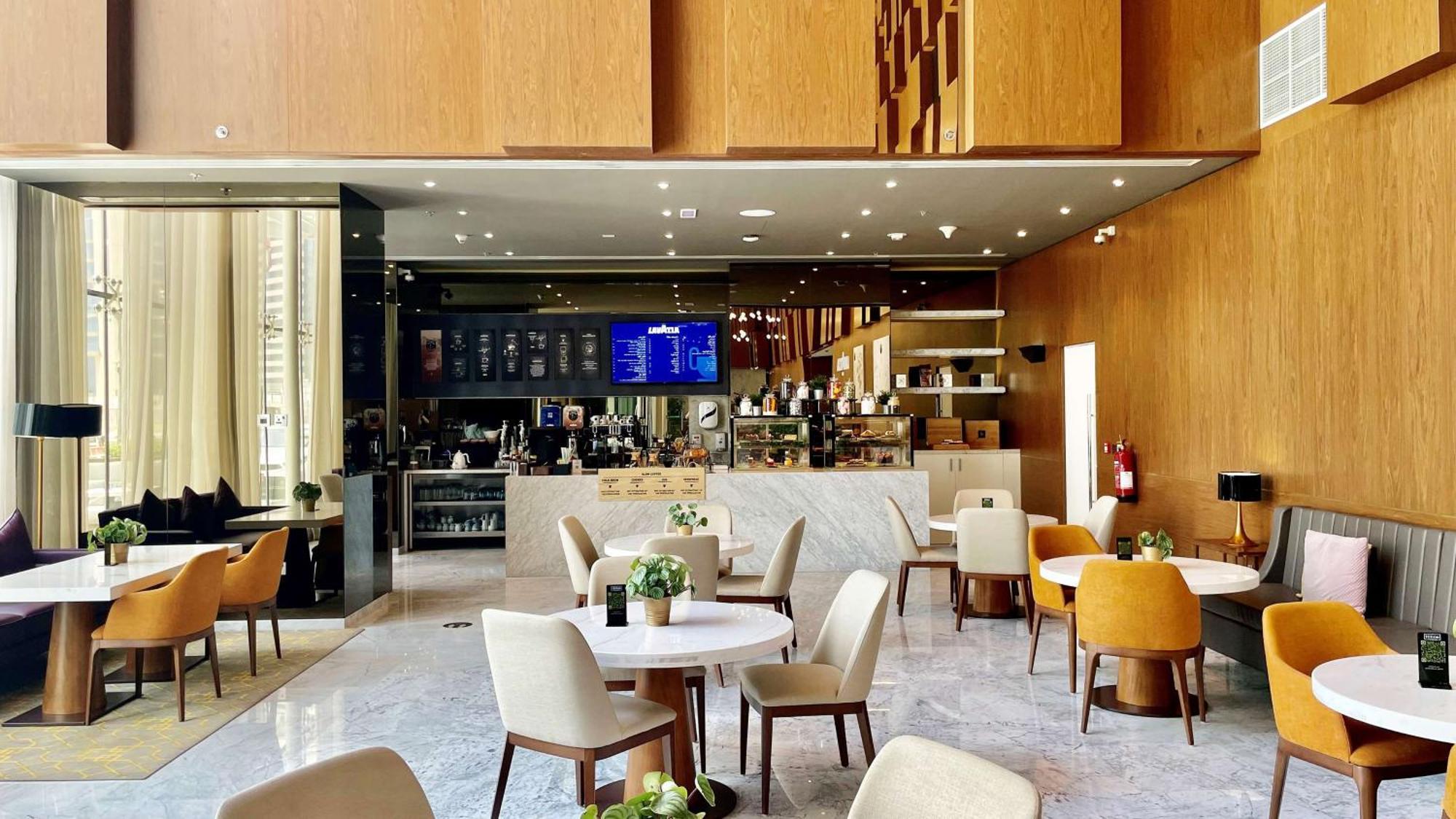 Aleph Doha Residences, Curio Collection By Hilton Luaran gambar The lounge at the airport